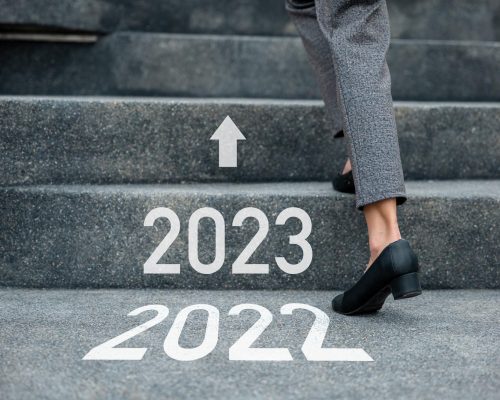 Businesswoman hurry up walking stairway from 2022 2023